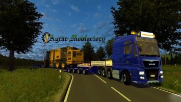 MAN TGX Euro6 with low loader